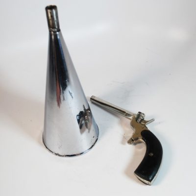 Gun and watch vanish funnel circa 1890