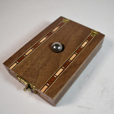 Karpinski's Cabala: ball through glass.