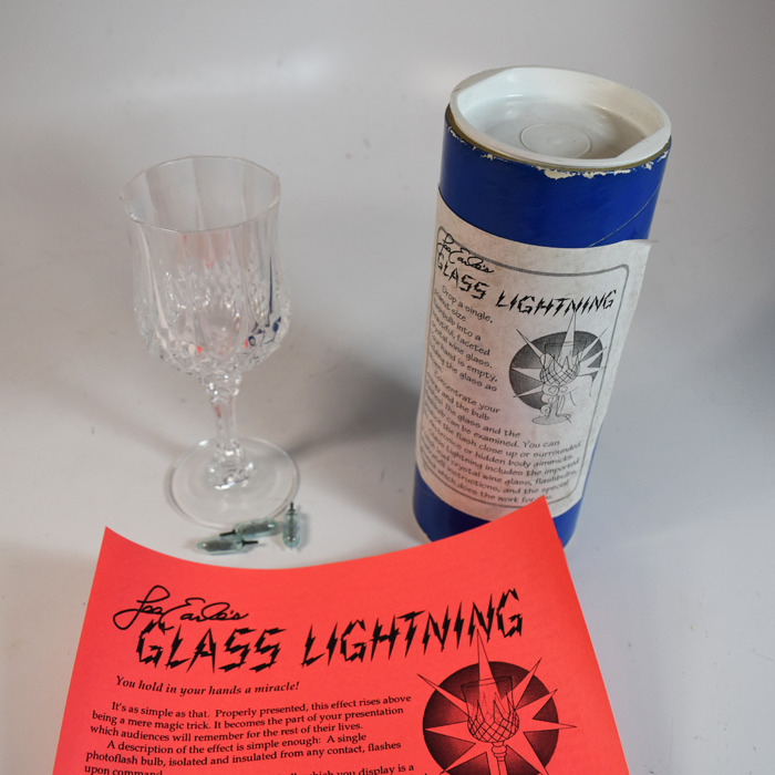 Lee Earle’s Glass Lightening flashbulb lights in a crystal glass