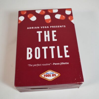 The Bottle by Adrian Vega: his signature: effect signed card in bottle